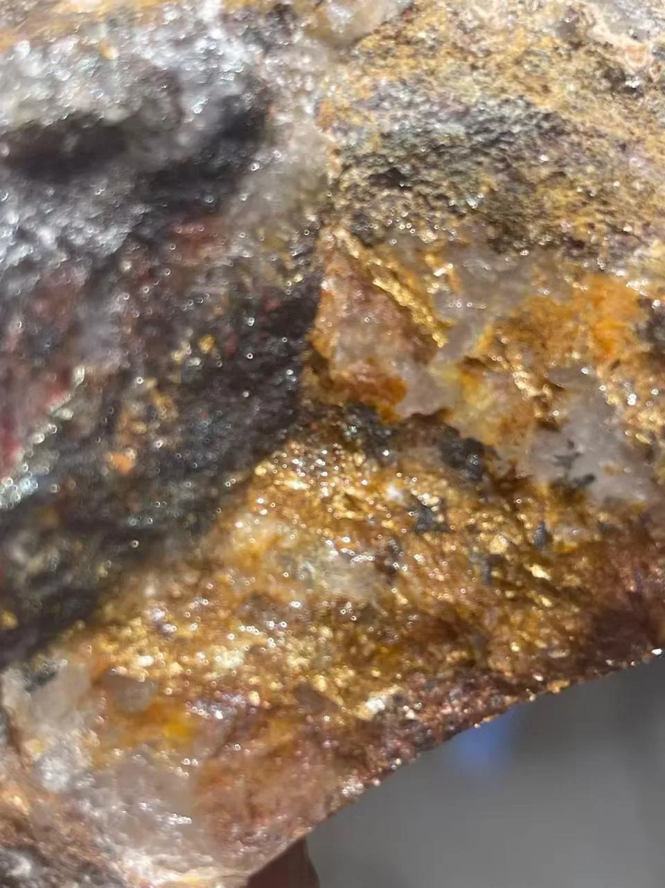 Close detail of gold-bearing material documented by Bile Mining Company